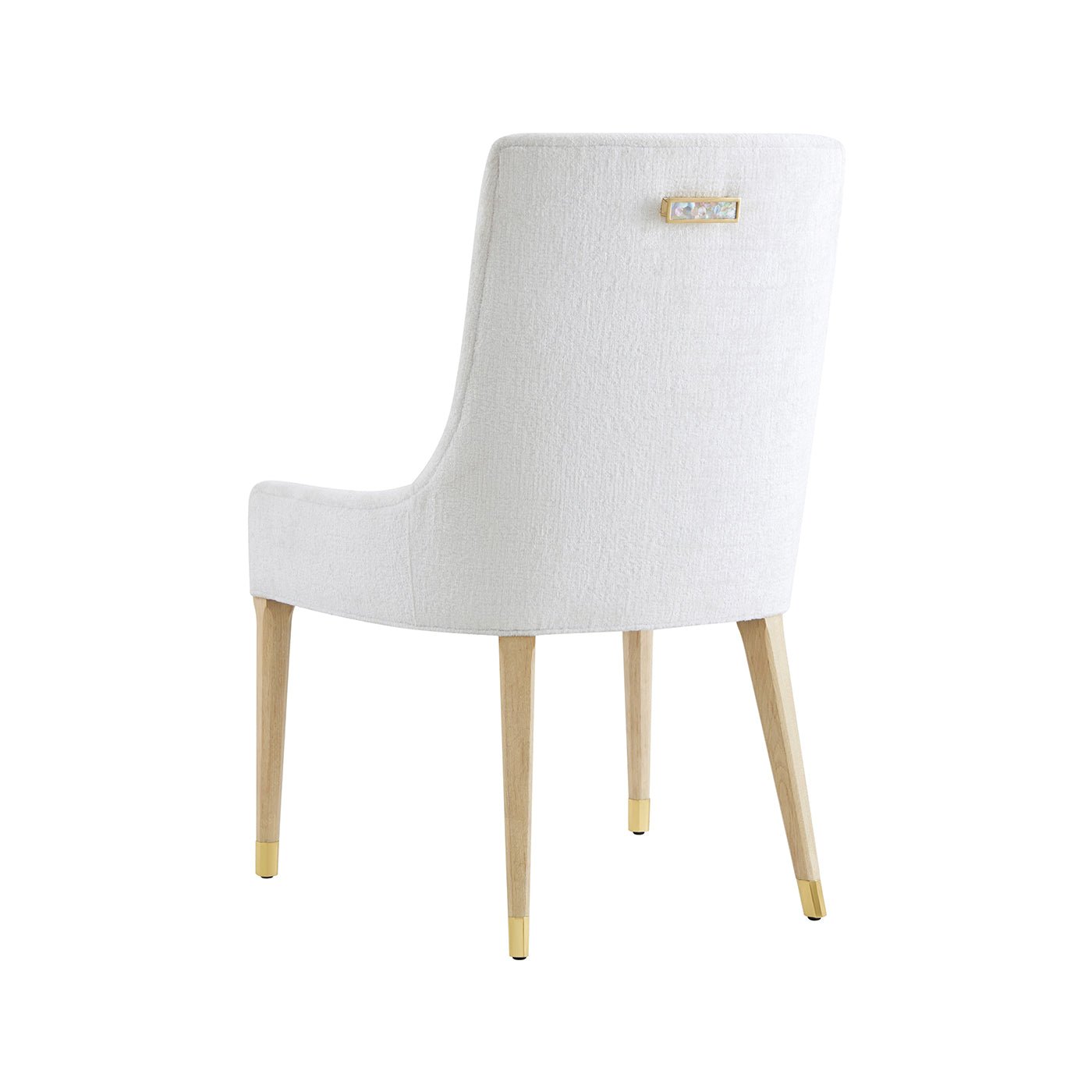 White dining chair, rear angle with gold detail.
