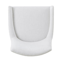 Top view of white upholstered dining chair seat.