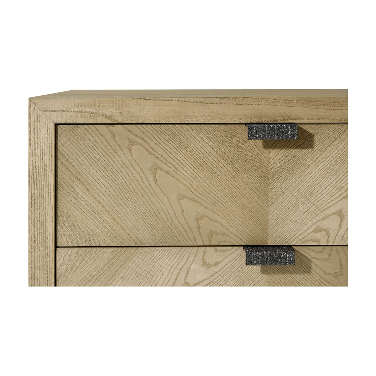 Close-up of top drawer and handle on nightstand.