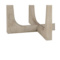 Close-up of interlocking wooden base on dining table.