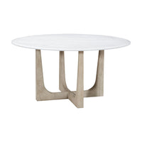 Round dining table with white top and wood base.