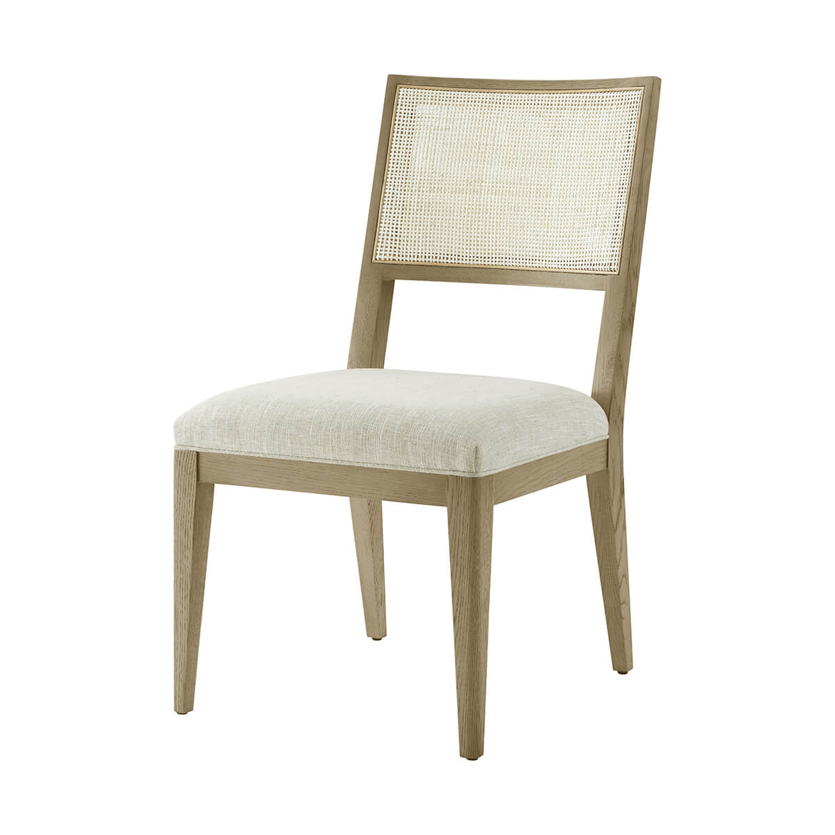 Light oak dining chair front view with cane back.