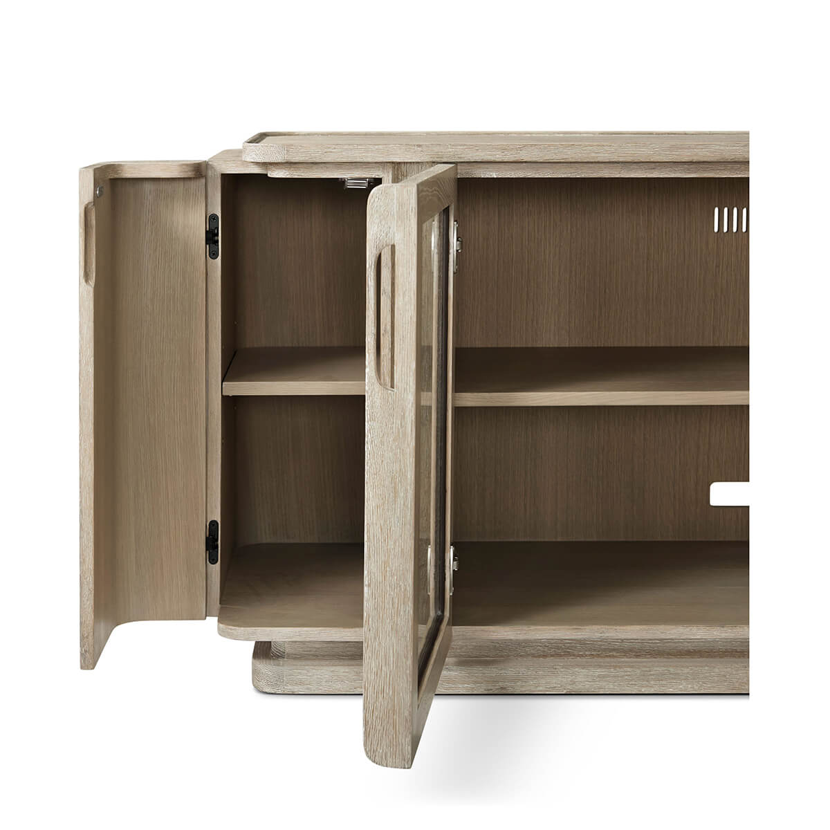 Open corner of oak media console, interior shelves visible.