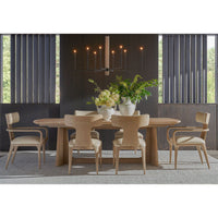 Dining room setup with light oak mid-century table and chairs.