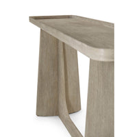 Side angle showing light oak modern console table base.