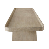 Close-up of light oak modern console table edge.