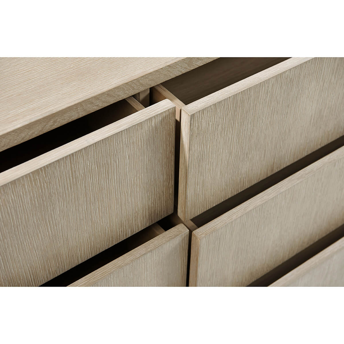 Light oak modern dresser, close-up of drawer detail.