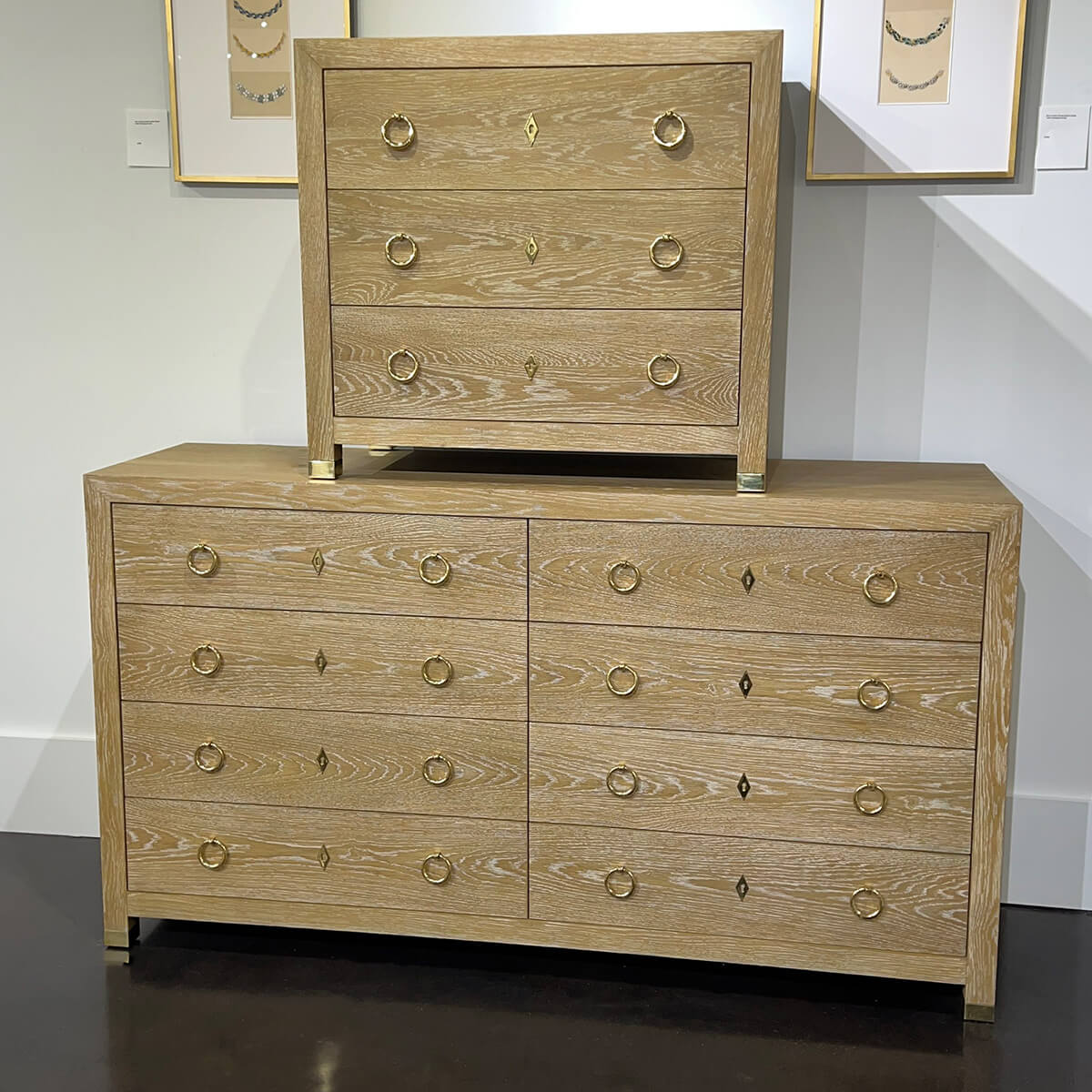 Light oak dresser with matching chest on top.