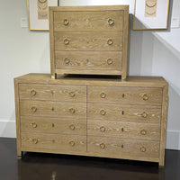 Light oak dresser with matching chest on top.