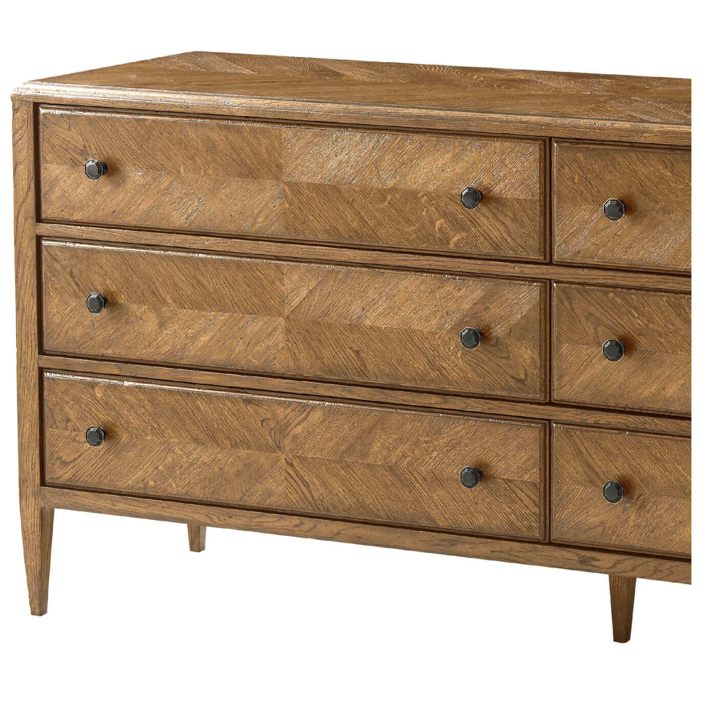 Dresser showing detailed parquetry design and handles.