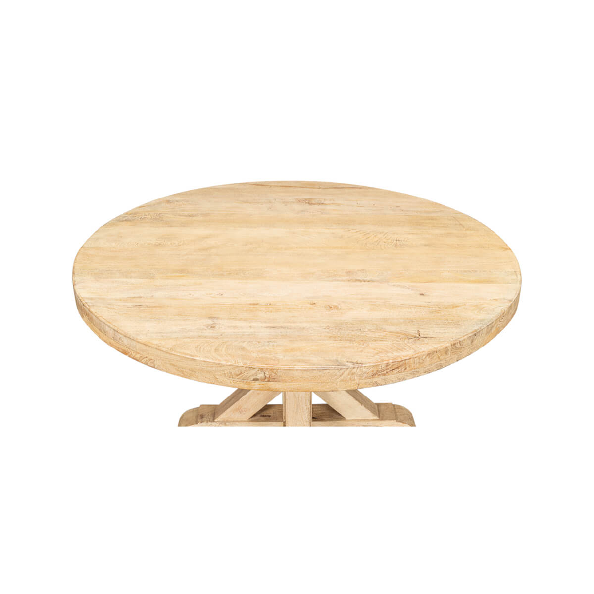Light wood round dining table top view.