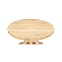 Light wood round dining table top view.