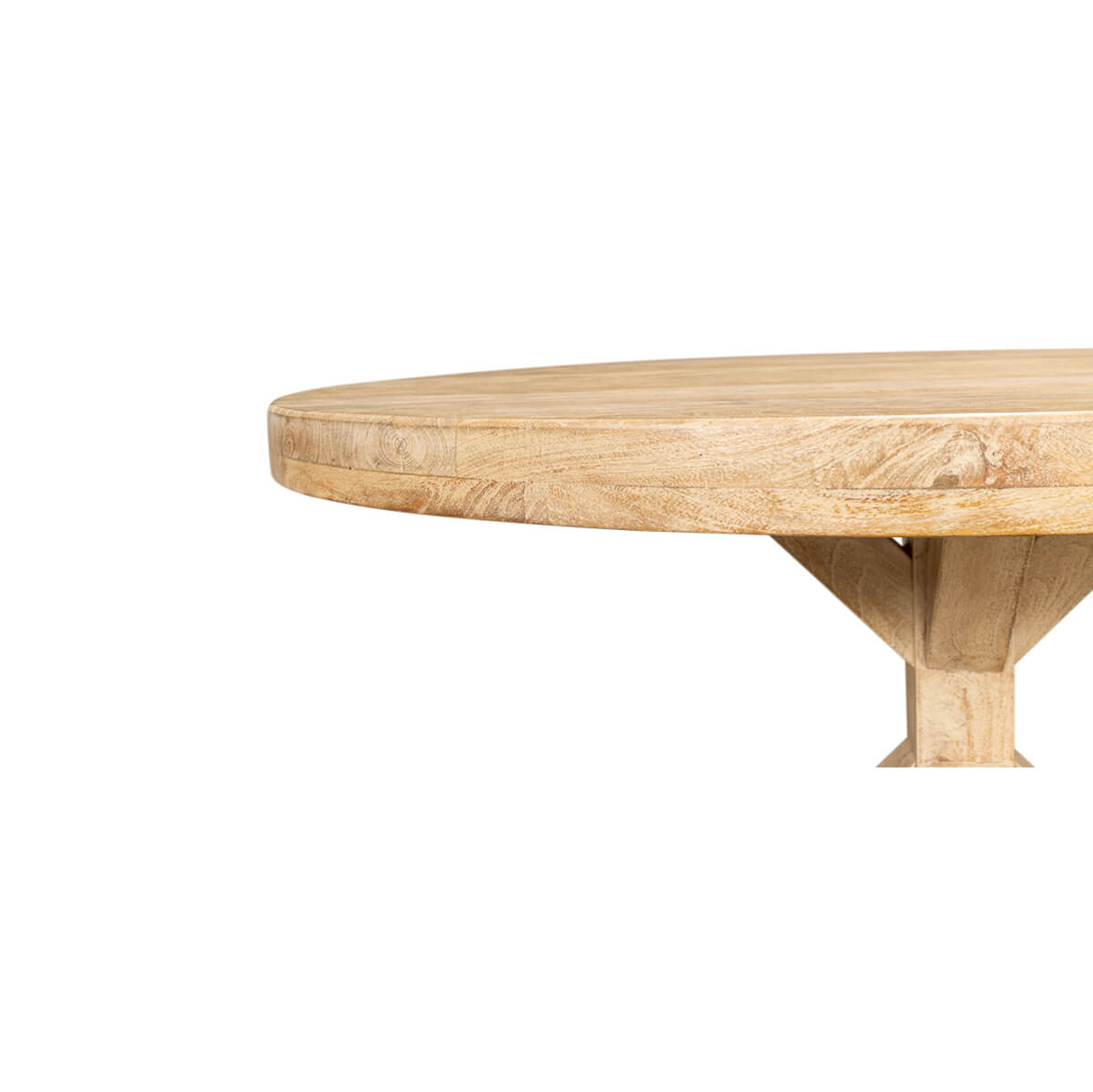 Light wood dining table close-up of edge and base.