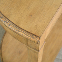 Top view of light wood console table corner.