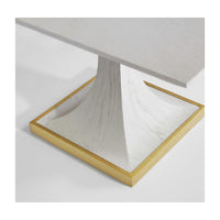 Close-up of art deco table base with gold trim.