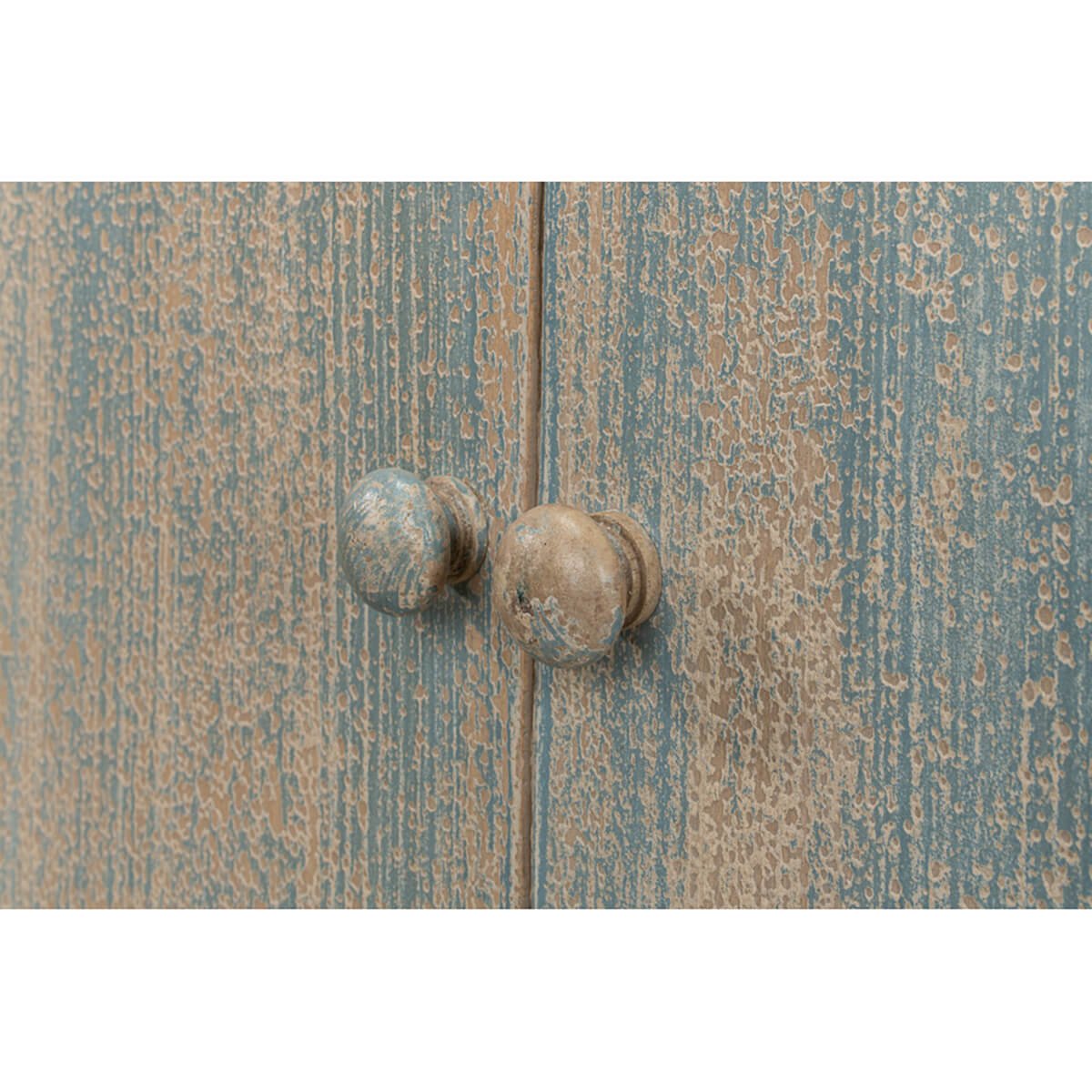 Blue buffet door knobs, distressed finish, close-up.