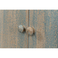 Blue buffet door knobs, distressed finish, close-up.