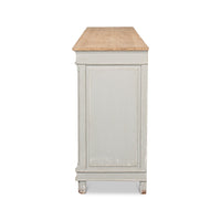 Side profile of gray antique buffet with wooden top.