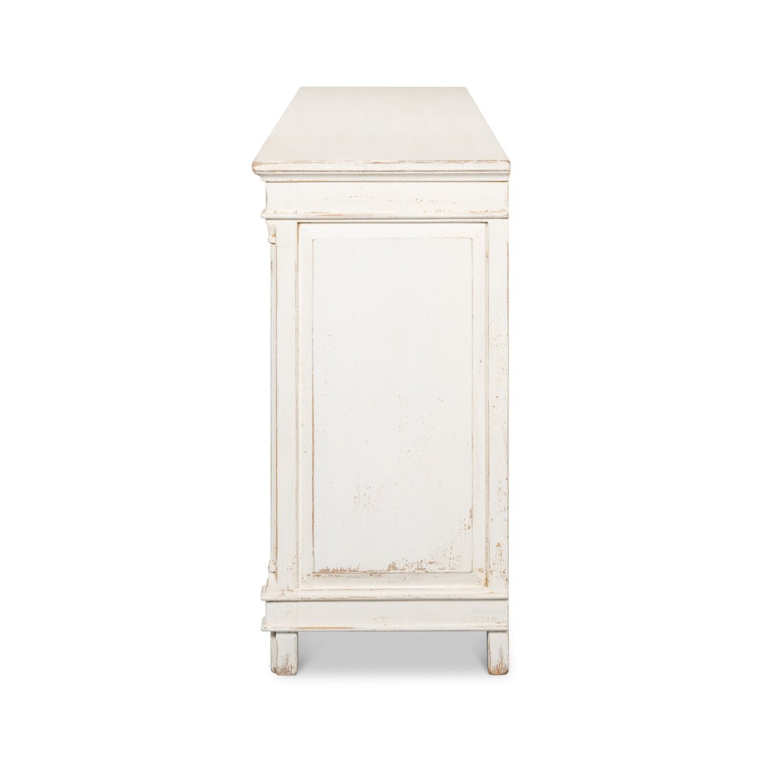 Side view, white Directoire buffet, elegant paneling.