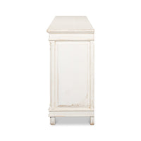 Side view, white Directoire buffet, elegant paneling.