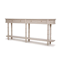 Long faux bamboo console table, angled front view.