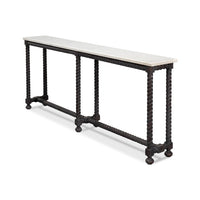 Angled view of marble top console table