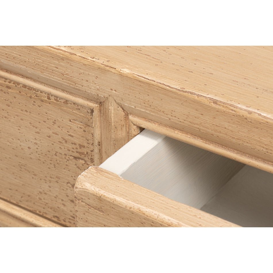 Open drawer detail on console table.