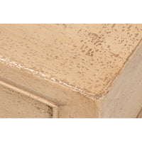 Close-up of distressed finish on console table.