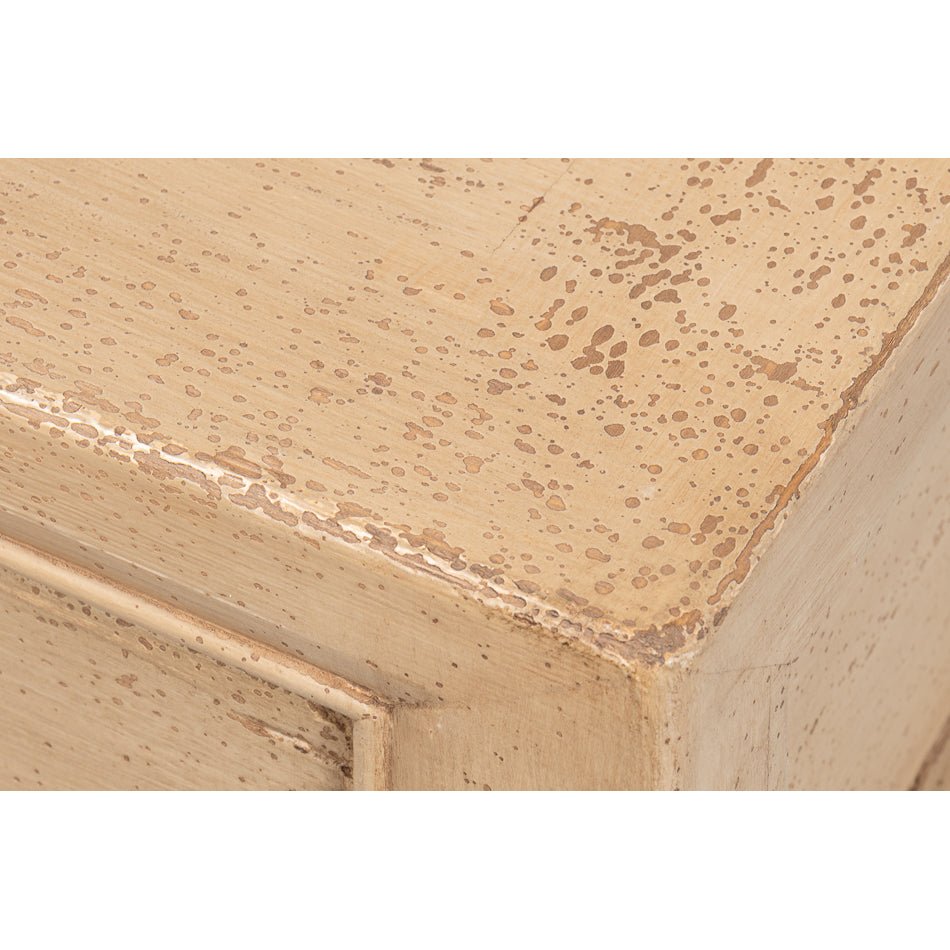 Close-up of distressed finish on console table.