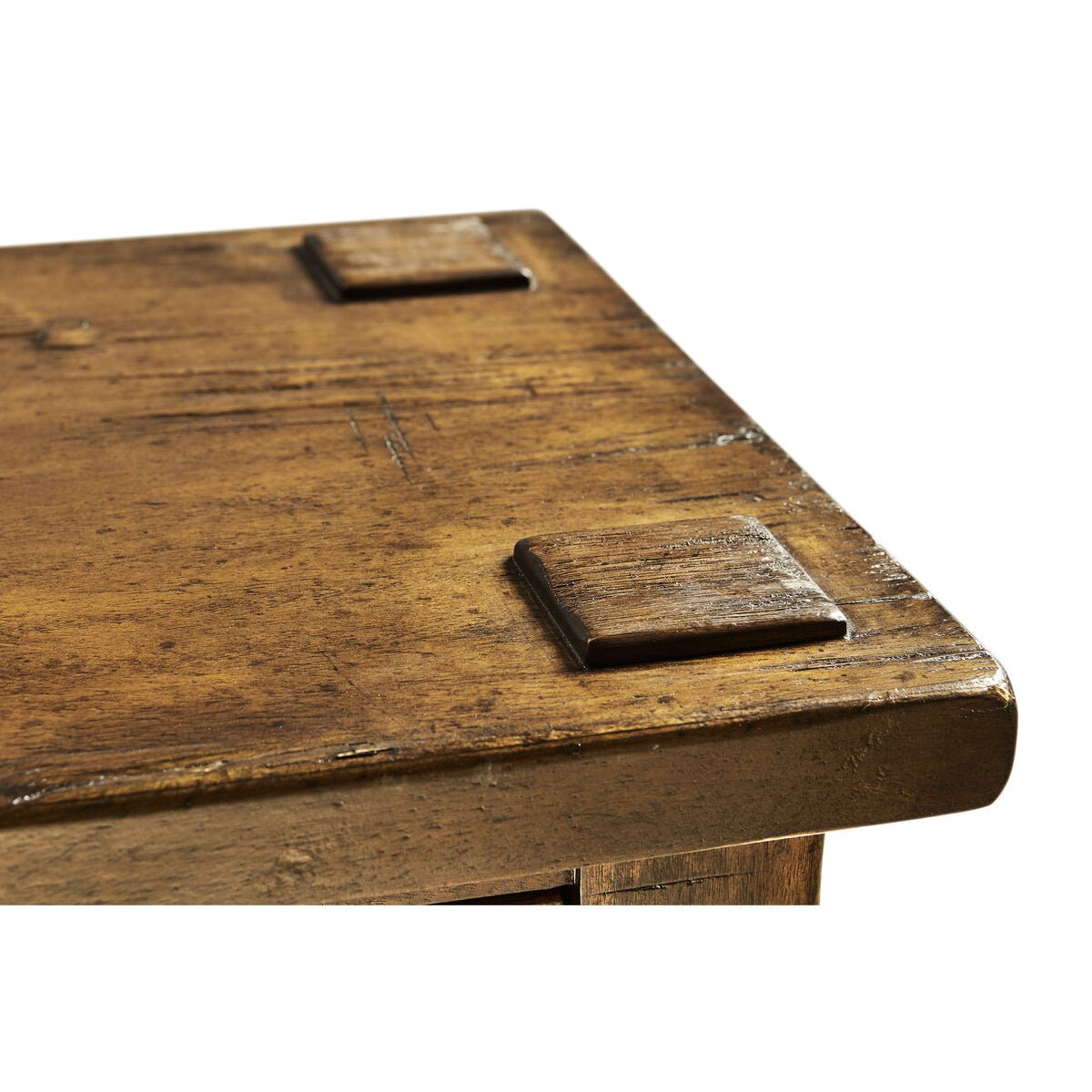 Close-up of corner detailing on walnut console table