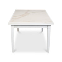 White Italian dining table, condensed, top-down view.