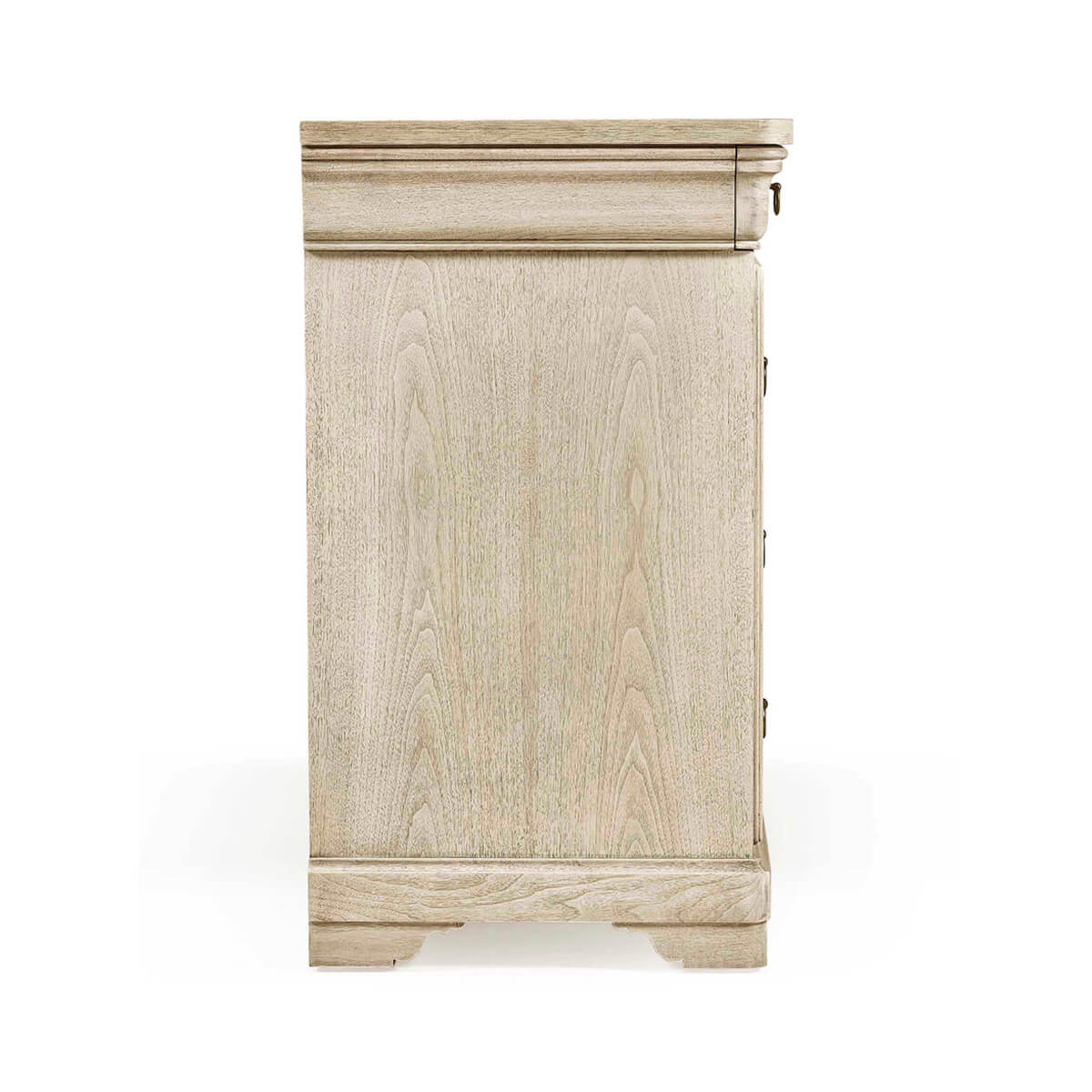 Side view of dresser, showing wood grain and detailing.