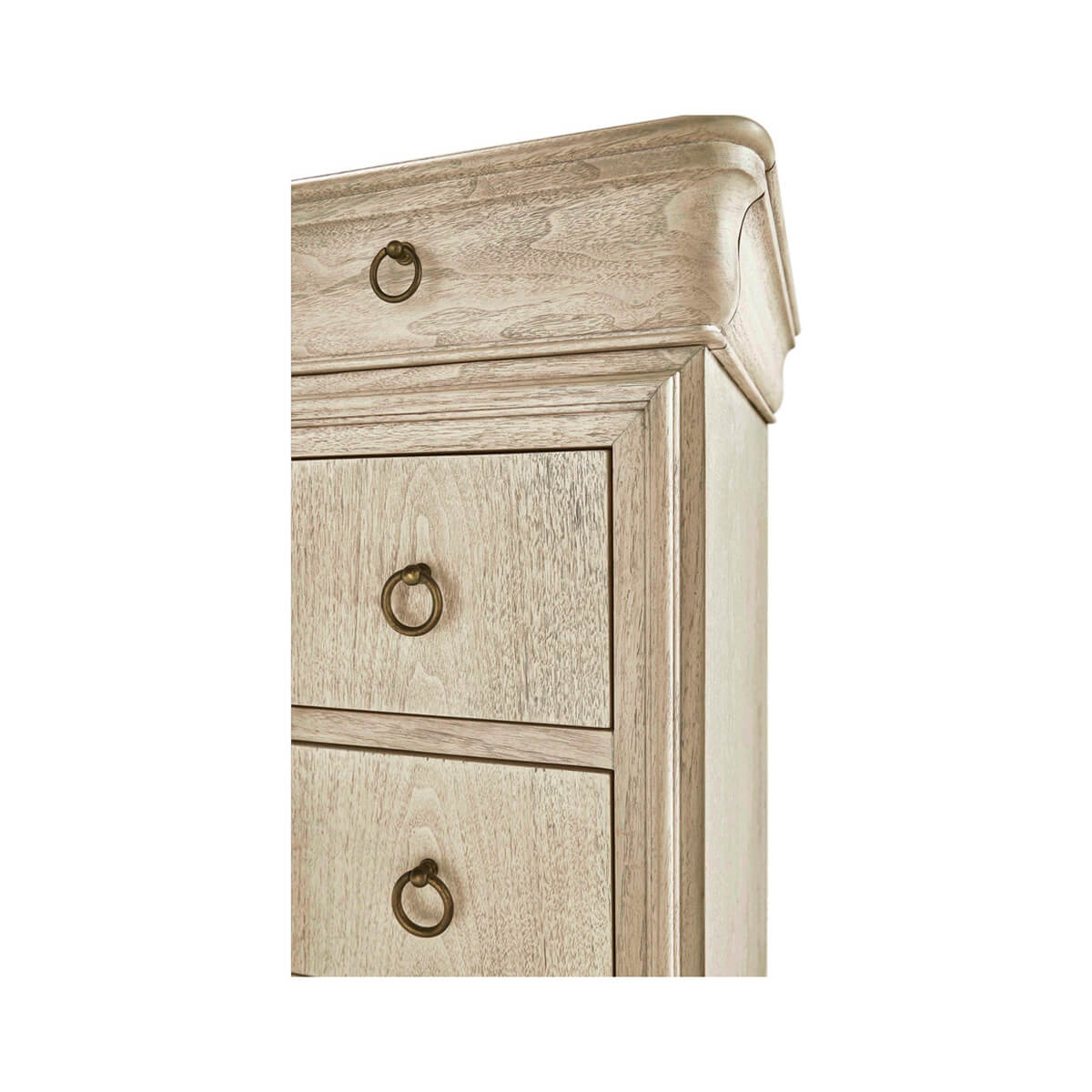 Detailed corner view of dresser, showing drawer handles and edges.