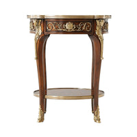Side profile of Louis XV mahogany lamp table.