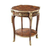 Ornate Louis XV mahogany lamp table, angled view.