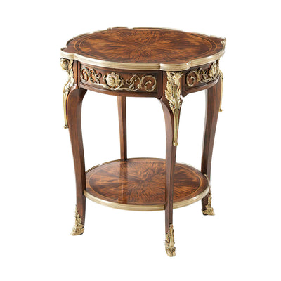 Ornate Louis XV mahogany lamp table, angled view.