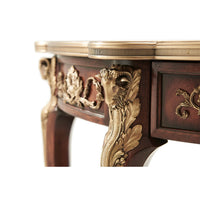 Close-up of decorative elements on Louis XV console table.