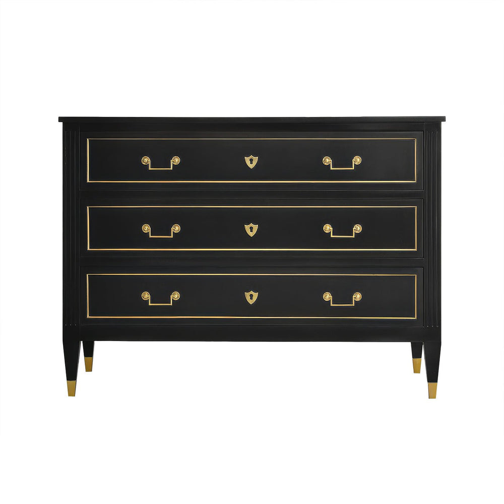 Black Louis XVI dresser with gold handles, front view.