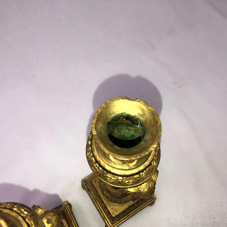 Top view of bronze Louis XVI candelabra with green patina.