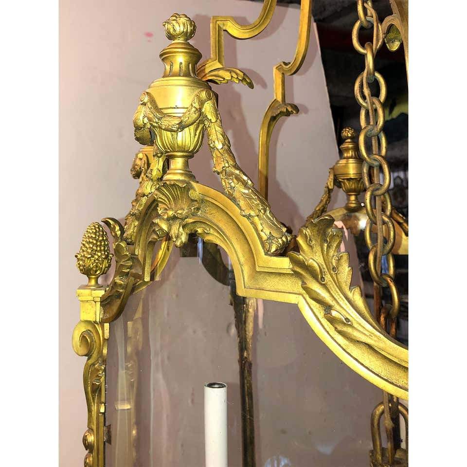 Detailed top design of Louis XVI bronze lantern.