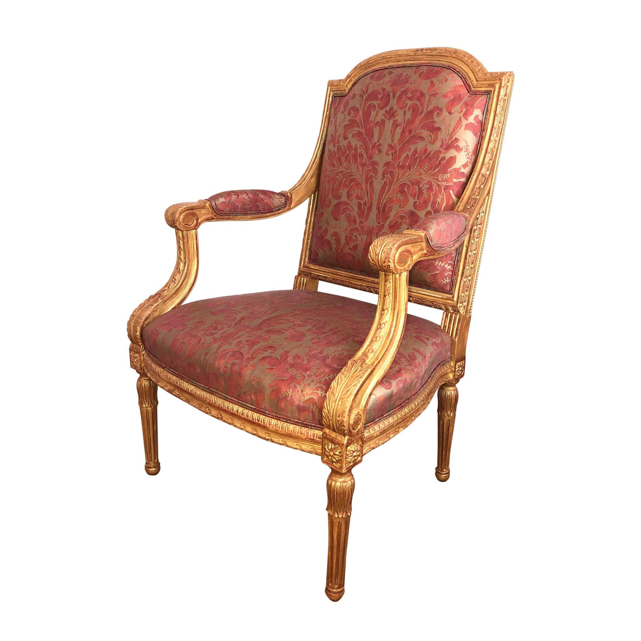 Louis XVI carved giltwood fauteuil, side view.