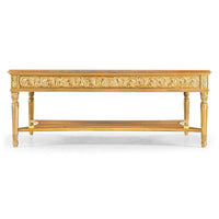 Front view of square coffee table with intricate carvings.