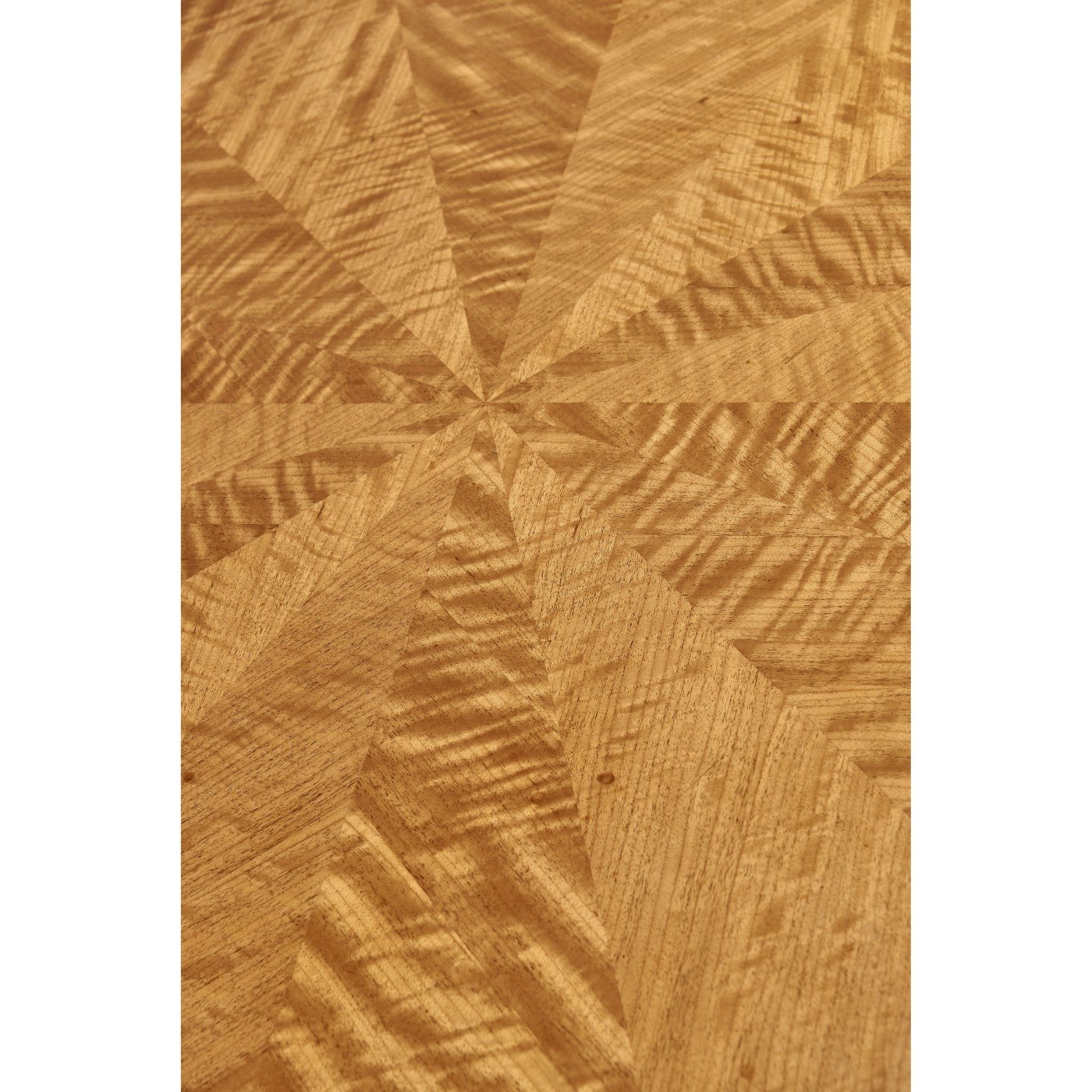 Detailed view of wood pattern on coffee table surface.