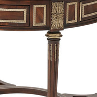 Close-up of table leg and decorative accents.
