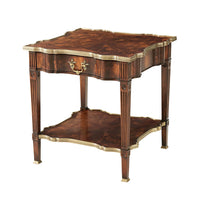 Louis XVI mahogany end table with decorative edging.