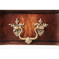 Detailed drawer handle on Louis XVI end table.