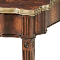 Carved leg detail on Louis XVI mahogany end table.