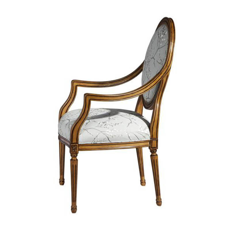 Louis XVI armchair side profile, floral upholstery design.