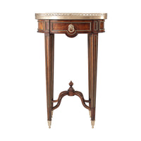 Oval end table, straight front view, elegant design.