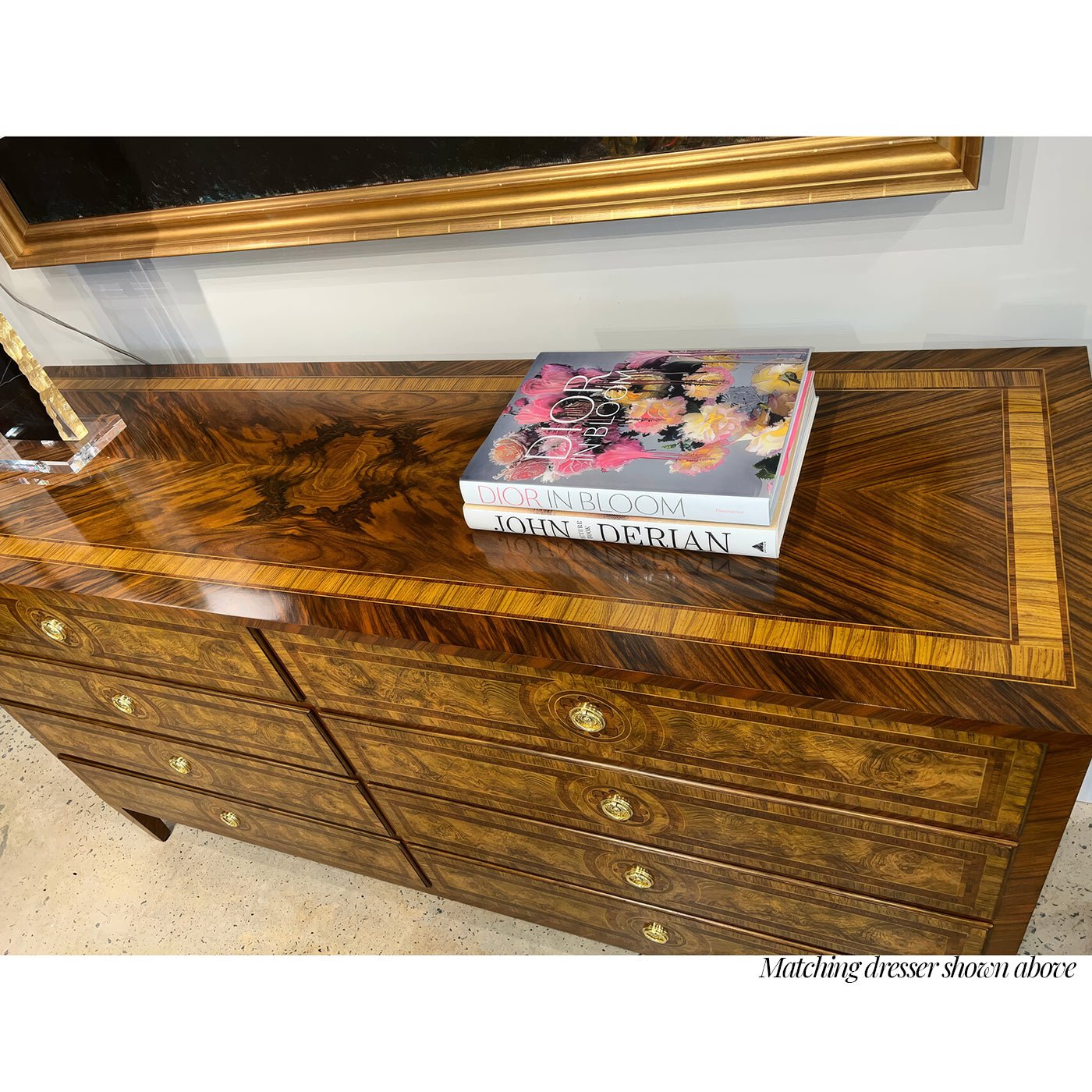 Top view of Louis XVI nightstand with books and decor.